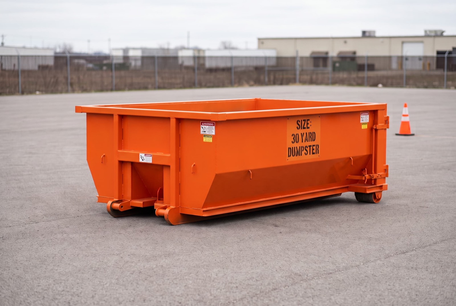 30 yard roll-off dumpster on a paved lot